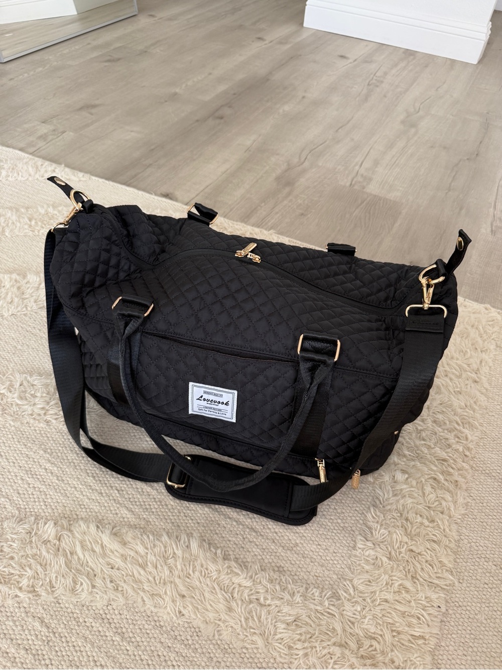 Quilted Black Weekender Travel Bag with Gold Accents